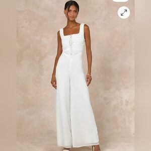 Majorly Iconic White Swiss Dot Ruffled Lace-Up Jumpsuit